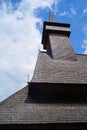 The roof and the tower covered with shingles of the wooden church from Botiza, Maramures County. Royalty Free Stock Photo